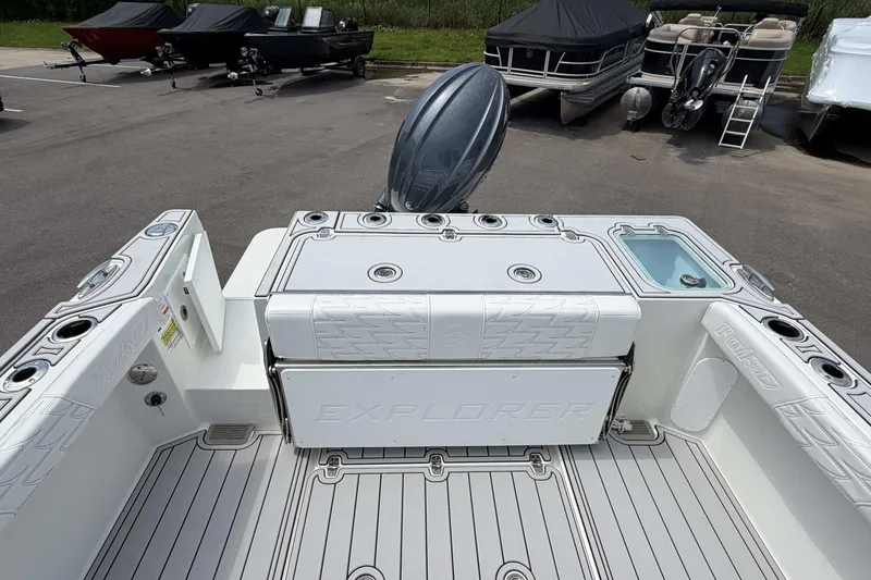 Slide: The Image of 2027 Parker 227 Explorer boat deck with seating and storage compartments. - 5
