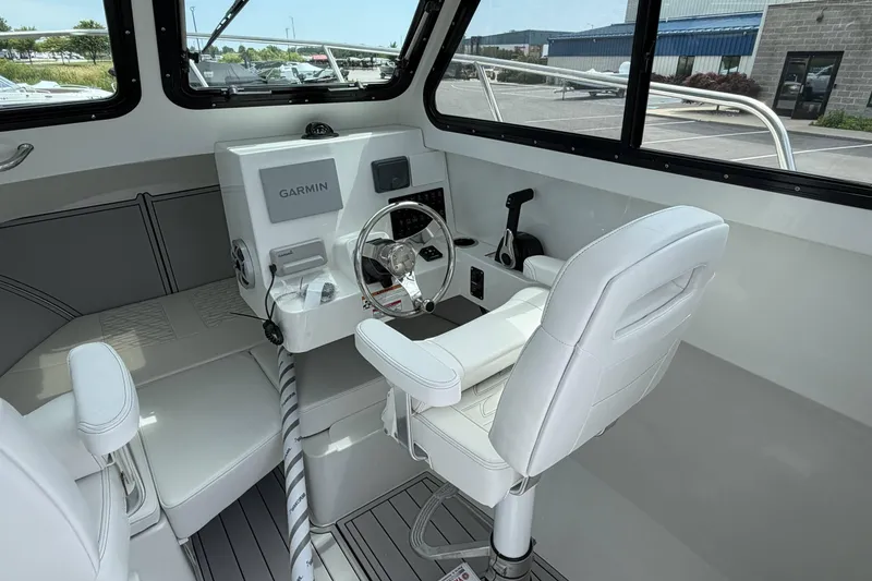 Slide: The Image of Interior of 2027 Parker 227 Explorer boat with Garmin navigation system. - 13