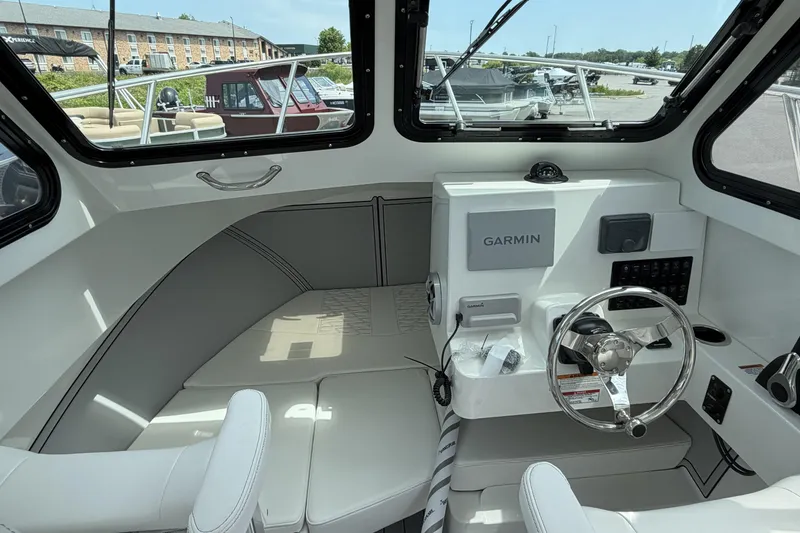 Slide: The Image of Interior of 2027 Parker 227 Explorer boat with Garmin navigation system. - 14