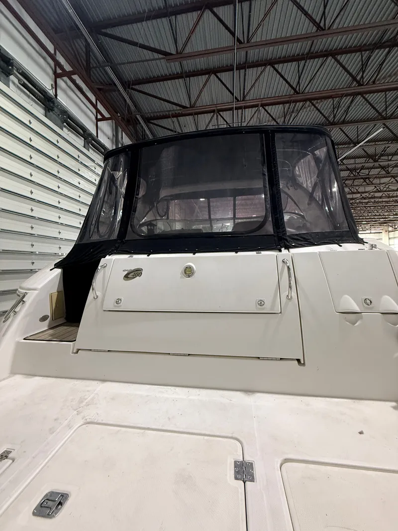 Slide: The Image of 2004 Cruisers Yachts 400 Express in a storage facility. - 3