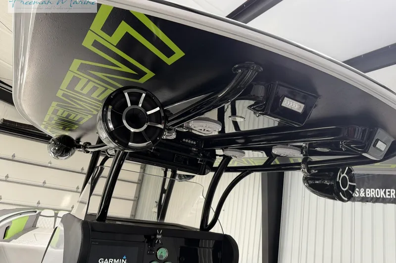 Slide: The Image of 2017 Statement 380 Open boat interior with advanced electronics and sleek design. - 22