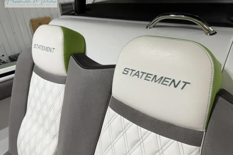 Slide: The Image of Luxury seating on a 2017 Statement 380 Open boat with embroidered branding. - 31