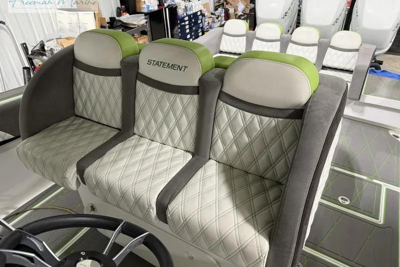 Slide: The Image of Luxury seating on 2017 Statement 380 Open boat, featuring diamond-stitched upholstery and modern design. - 24