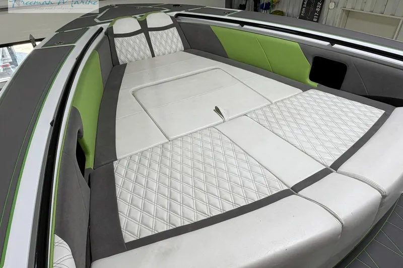 Slide: The Image of Luxurious interior of 2017 Statement 380 Open boat with green and white seating. - 14