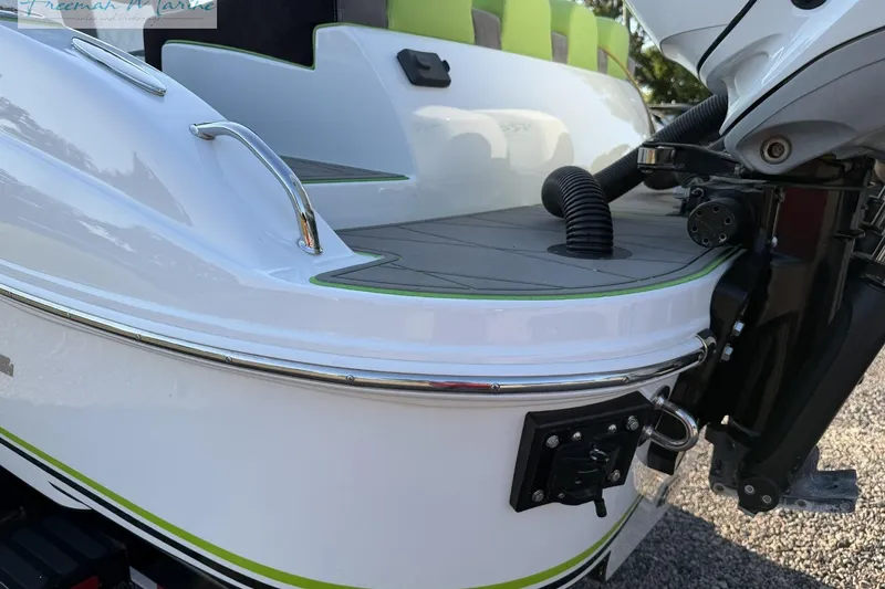 Slide: The Image of 2017 Statement 380 Open boat stern with motor and sleek design details. - 7