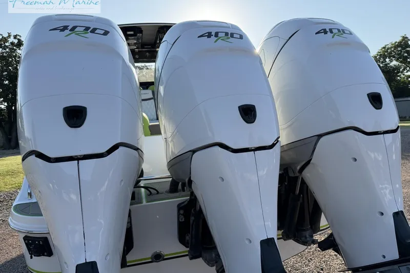 Slide: The Image of Triple 400R outboard engines on a 2017 Statement 380 Open boat. - 5