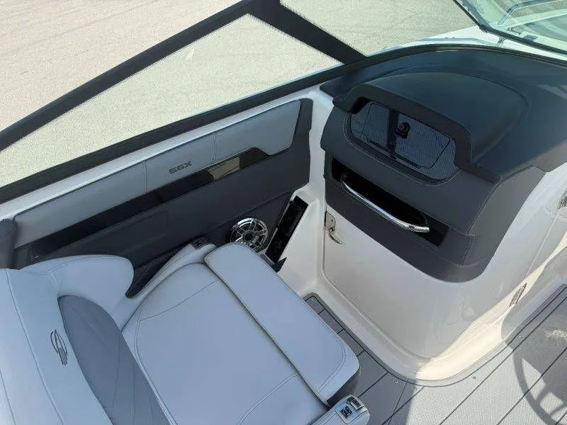 Slide: The Image of Interior view of a 2026 Chaparral SSX 30 with modern seating and dashboard. - 18