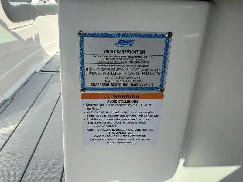 Slide: The Image of Yacht certification and warning labels on a boat. - 35