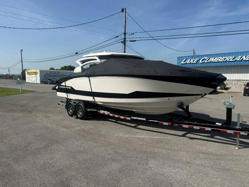 Slide: The Image of 2026 Chaparral SSX 30 on a trailer, parked on land. - 50