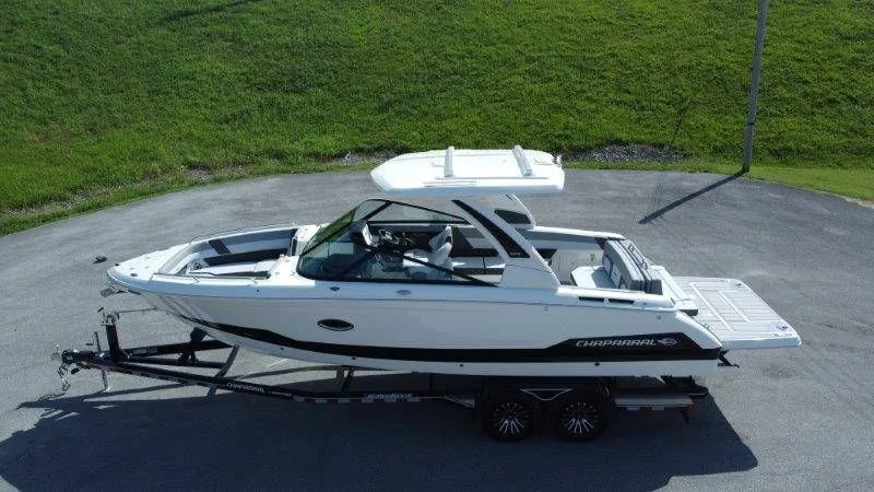 Slide: The Image of 2026 Chaparral SSX 30 on a trailer, ready for adventure. - 2