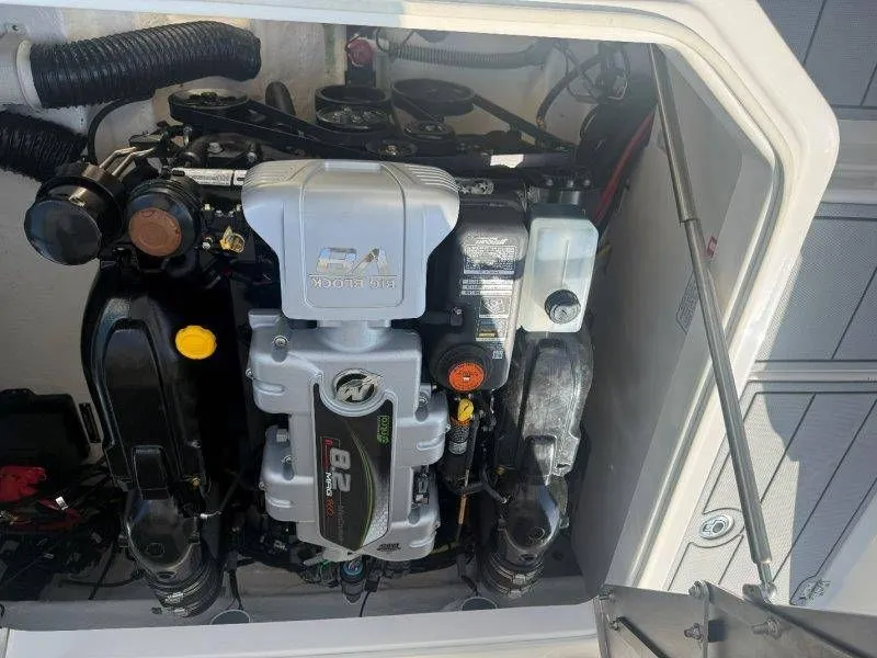 Slide: The Image of Engine compartment of a 2026 Chaparral SSX 30 featuring a powerful engine. - 36