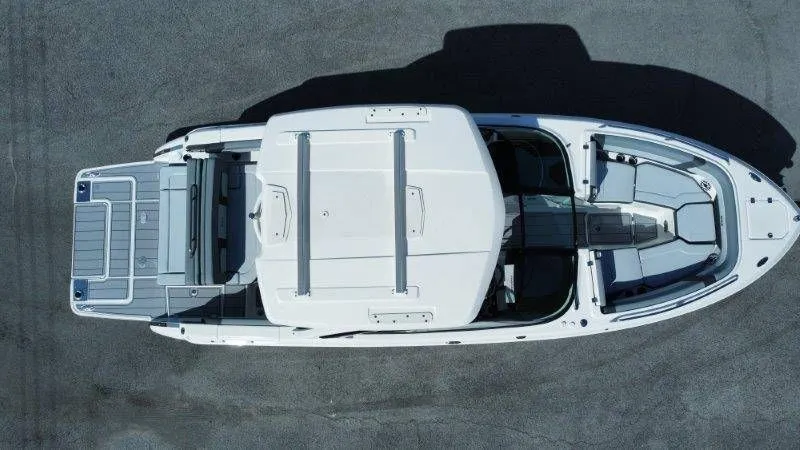 Slide: The Image of Aerial view of a modern boat with spacious deck and sleek seating. - 48