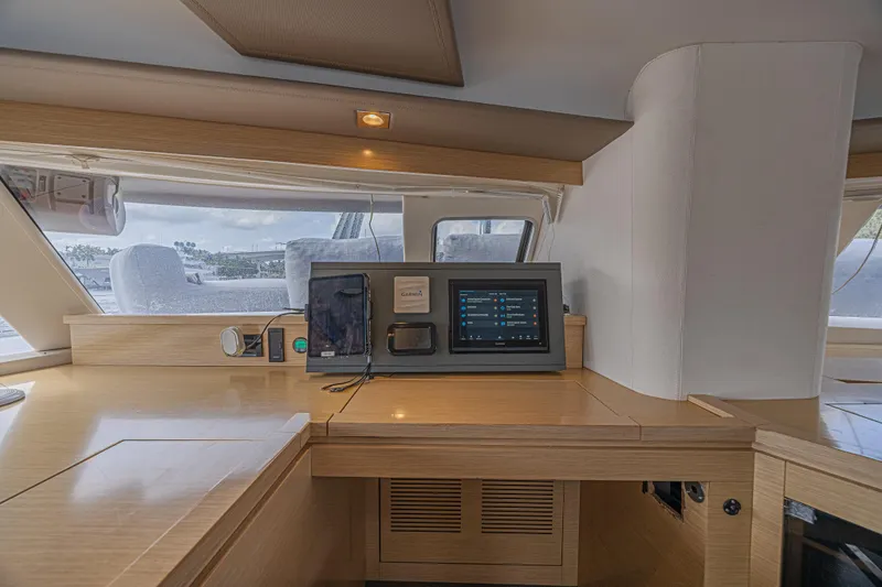 Slide: The Image of Interior of 2015 Fountaine Pajot Sanya 57 yacht with navigation equipment. - 14