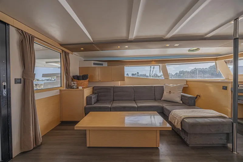 Slide: The Image of Luxurious interior of 2015 Fountaine Pajot Sanya 57 yacht with modern furnishings and panoramic windows. - 2