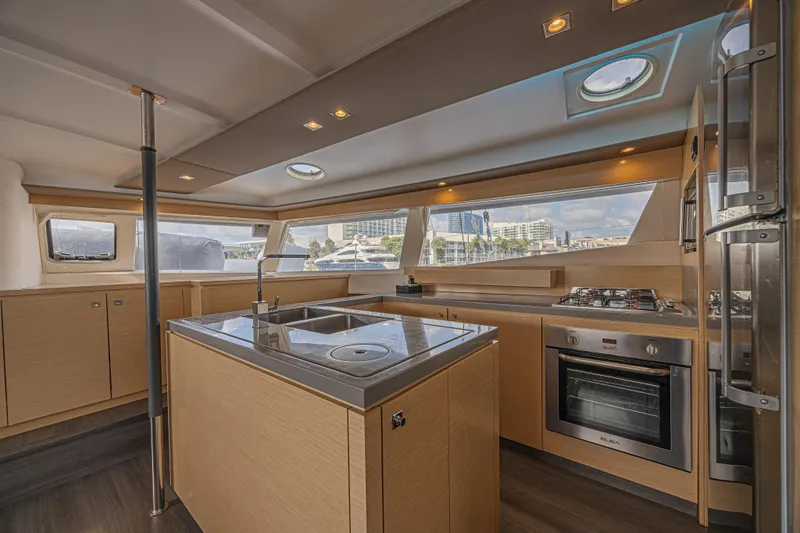 Slide: The Image of Luxurious kitchen interior of 2015 Fountaine Pajot Sanya 57 yacht with modern appliances. - 7