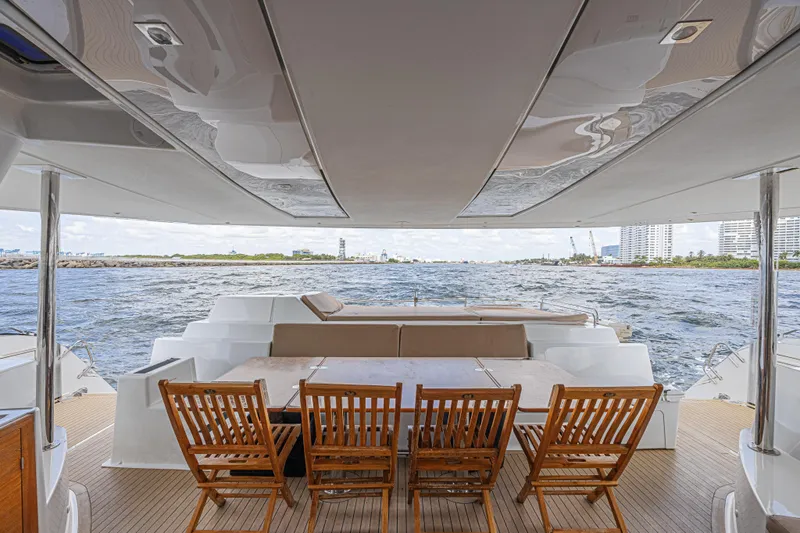 Slide: The Image of Luxury Fountaine Pajot Sanya 57 yacht deck with wooden chairs, ocean view, 2015 model. - 32