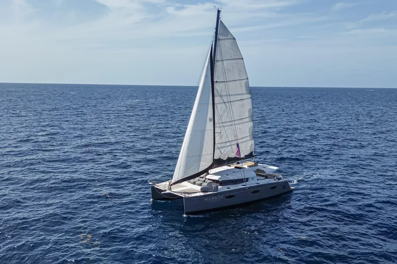 Slide: The Image of Sailing catamaran Fountaine Pajot Sanya 57, 2015 model, cruising on open sea. - 53