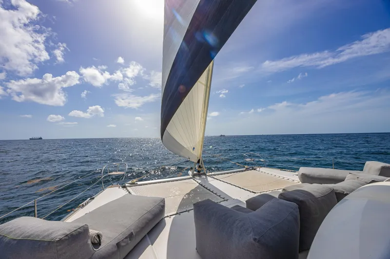 Slide: The Image of Luxurious 2015 Fountaine Pajot Sanya 57 sailing on open sea under clear skies. - 62