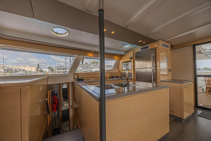 Slide: The Image of Luxurious interior of 2015 Fountaine Pajot Sanya 57 yacht with modern kitchen and scenic views. - 8