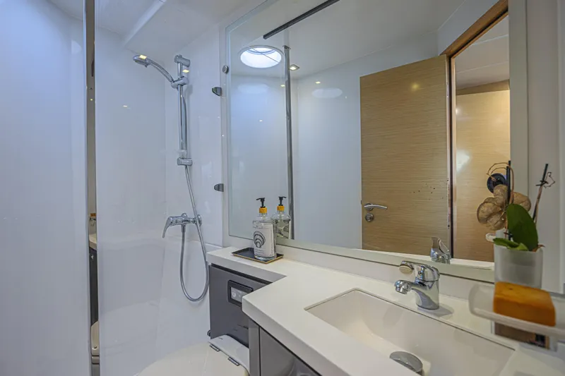 Slide: The Image of Luxurious bathroom in 2015 Fountaine Pajot Sanya 57 yacht, featuring modern fixtures and elegant design. - 20