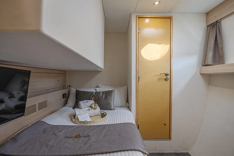 Slide: The Image of Cozy cabin interior of 2015 Fountaine Pajot Sanya 57 yacht with bed and modern decor. - 28