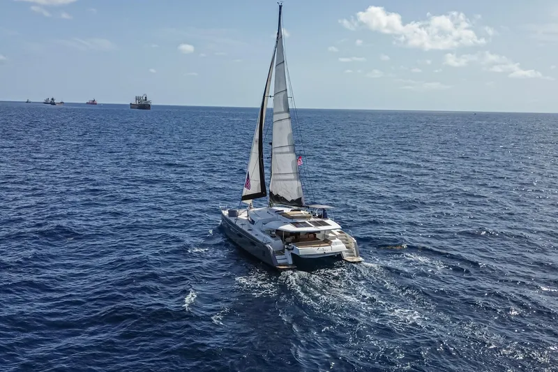 Slide: The Image of Sailing catamaran Fountaine Pajot Sanya 57, 2015 model, cruising on open sea. - 43