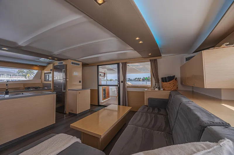 Slide: The Image of Luxurious interior of 2015 Fountaine Pajot Sanya 57 yacht with modern kitchen and seating area. - 3