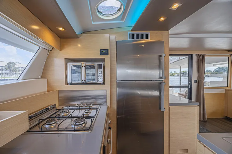 Slide: The Image of Modern kitchen interior of 2015 Fountaine Pajot Sanya 57 yacht with stainless steel appliances. - 11