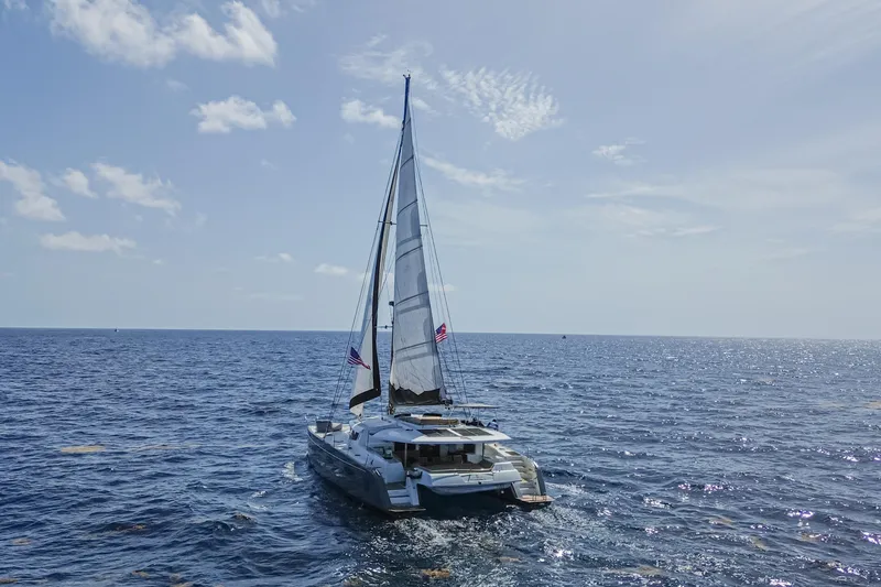 Slide: The Image of Sailing catamaran Fountaine Pajot Sanya 57, 2015 model, cruising on open sea. - 44