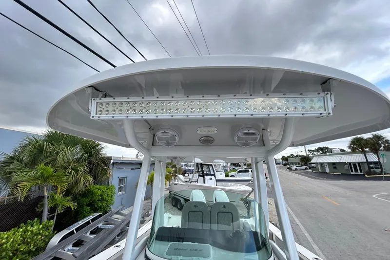 Slide: The Image of 2023 Sea Pro 259 Center Console boat with T-top and LED light bar. - 14