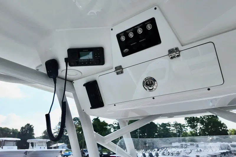 Slide: The Image of 2024 Sea Fox 248 Commander boat console with radio and control panel. - 11
