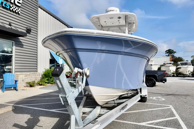 Slide: The Image of 2024 Sea Fox 248 Commander boat on trailer outside dealership. - 6