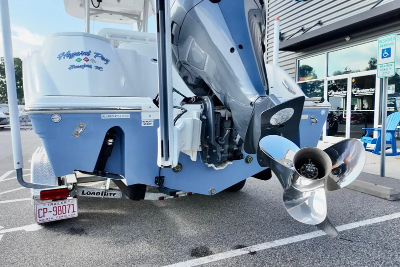 Slide: The Image of 2024 Sea Fox 248 Commander boat rear view with outboard motor and propeller. - 3