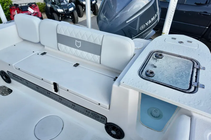 Slide: The Image of 2024 Sea Fox 248 Commander boat interior with seating and livewell. - 16