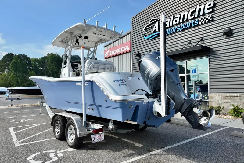 Slide: The Image of 2024 Sea Fox 248 Commander boat on trailer outside Avalanche Motorsports. - 4