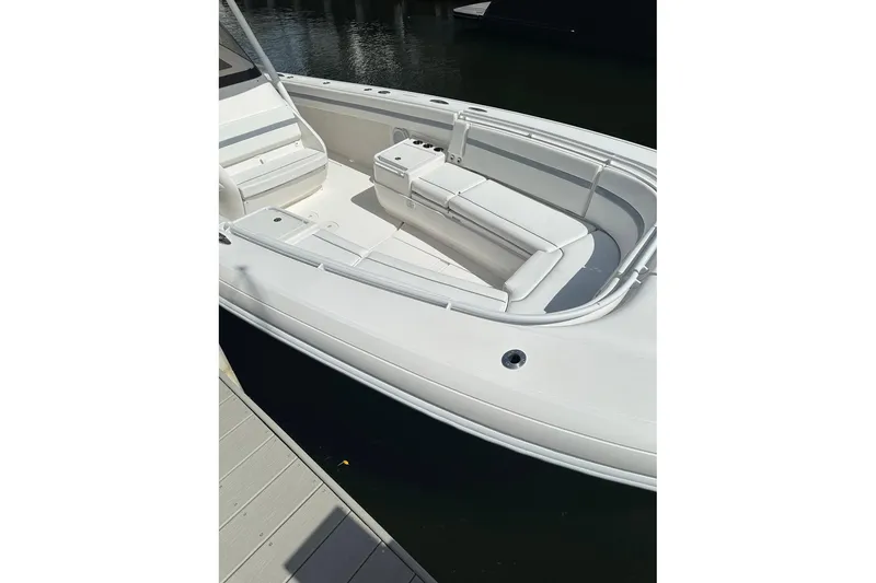 Slide: The Image of 2013 Intrepid 375 Center Console boat with spacious seating and sleek design. - 20