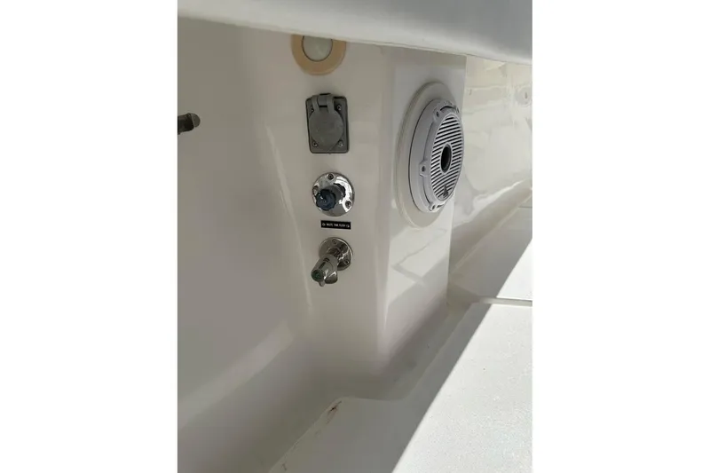 Slide: The Image of 2013 Intrepid 375 Center Console boat interior with speaker and control panel. - 15