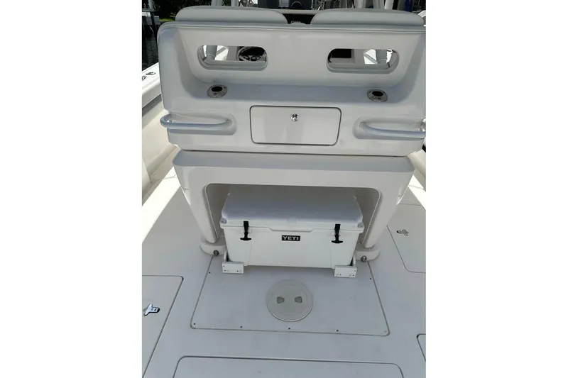 Slide: The Image of 2013 Intrepid 375 Center Console boat interior with Yeti cooler storage. - 14