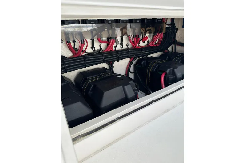 Slide: The Image of Electrical system of a 2013 Intrepid 375 Center Console boat, featuring batteries and wiring. - 23