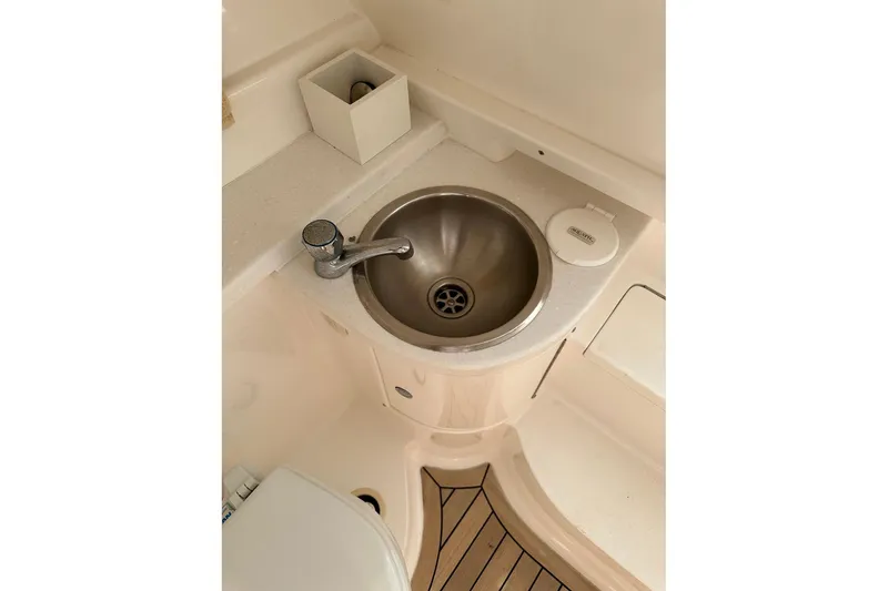 Slide: The Image of 2013 Intrepid 375 Center Console boat interior sink and countertop detail. - 26