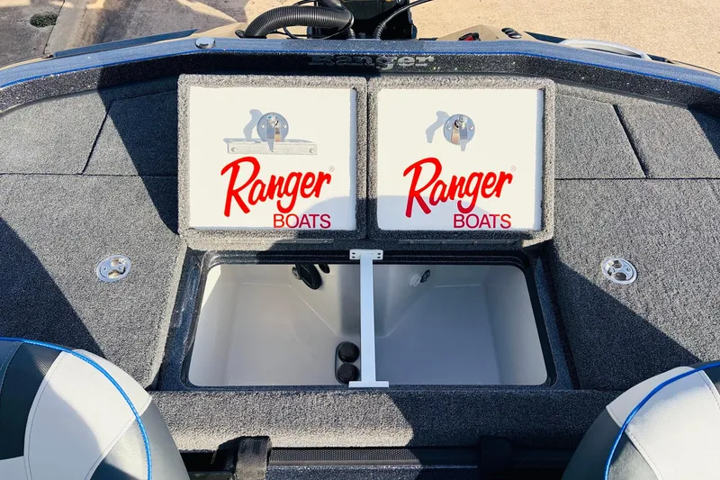 Slide: The Image of 2026 Ranger Z521 boat storage compartments with Ranger Boats logo. - 53