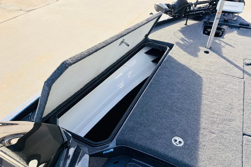 Slide: The Image of Open storage compartment on 2026 Ranger Z521 boat deck. - 20