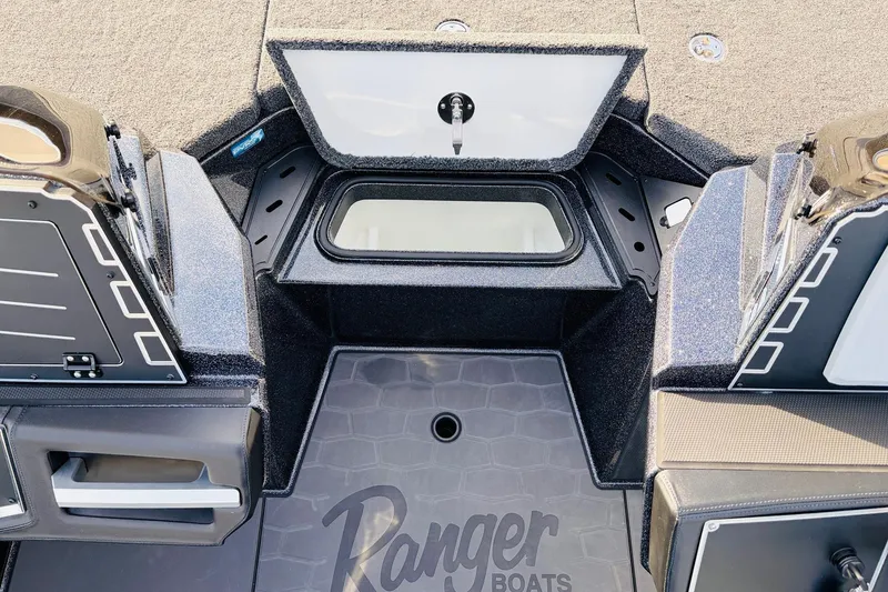 Slide: The Image of 2026 Ranger Z521 boat interior with storage compartments and sleek design. - 30