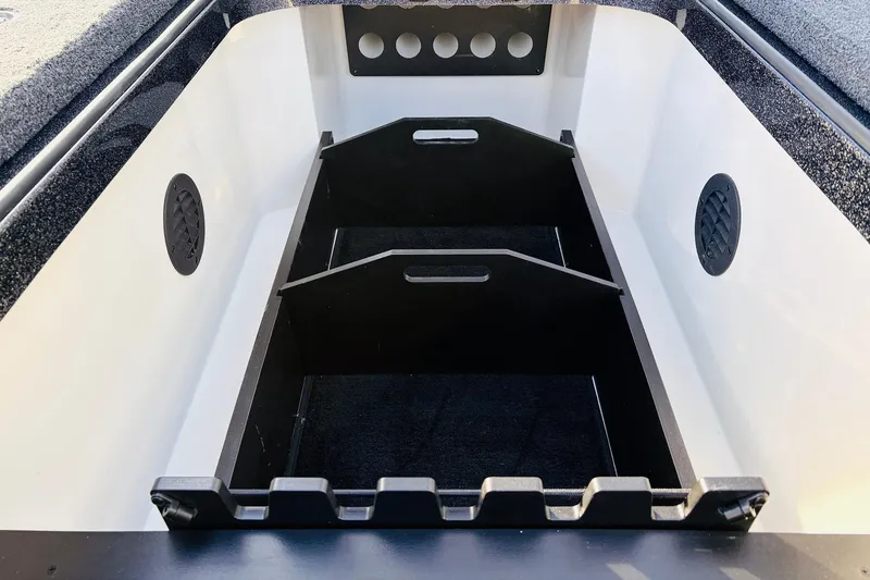 Slide: The Image of 2026 Ranger Z521 boat storage compartment with dividers and ventilation. - 23