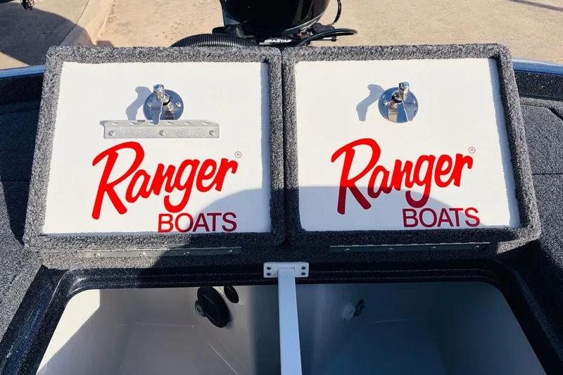 Slide: The Image of 2026 Ranger Z521 boat storage compartments with Ranger Boats logo. - 56