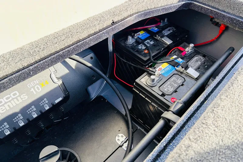 Slide: The Image of Battery compartment of 2026 Ranger Z521 boat with NOCO Genius GENPRO 10X4 charger. - 66