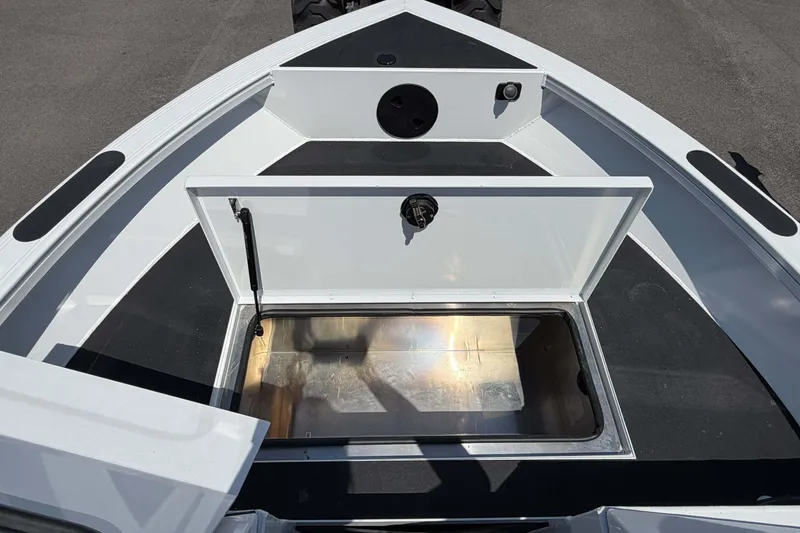 Slide: The Image of Bow storage compartment of 2027 Crestliner 1850 Commander boat, open and empty. - 15