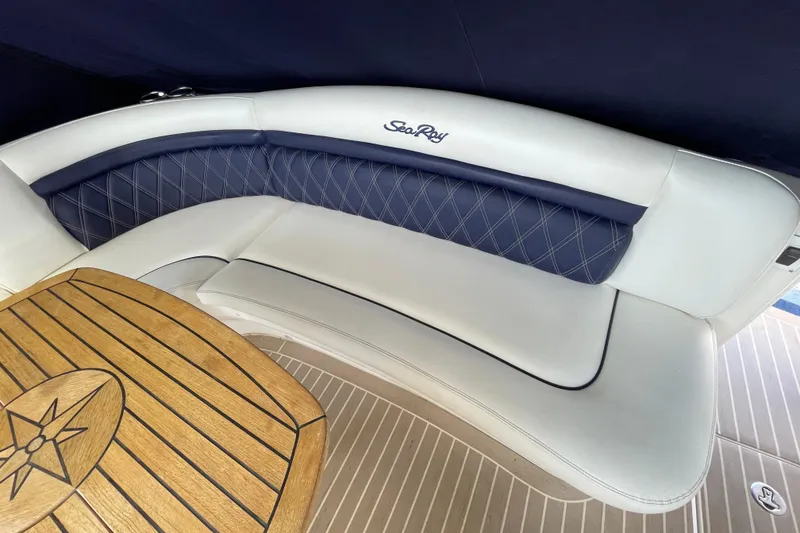 Slide: The Image of 2007 Sea Ray 40 Sundancer interior with elegant seating and wooden table. - 15