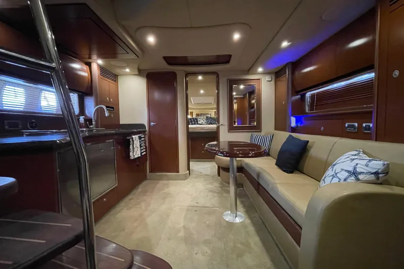 Slide: The Image of Luxurious interior of a 2007 Sea Ray 40 Sundancer yacht with elegant seating and modern amenities. - 22