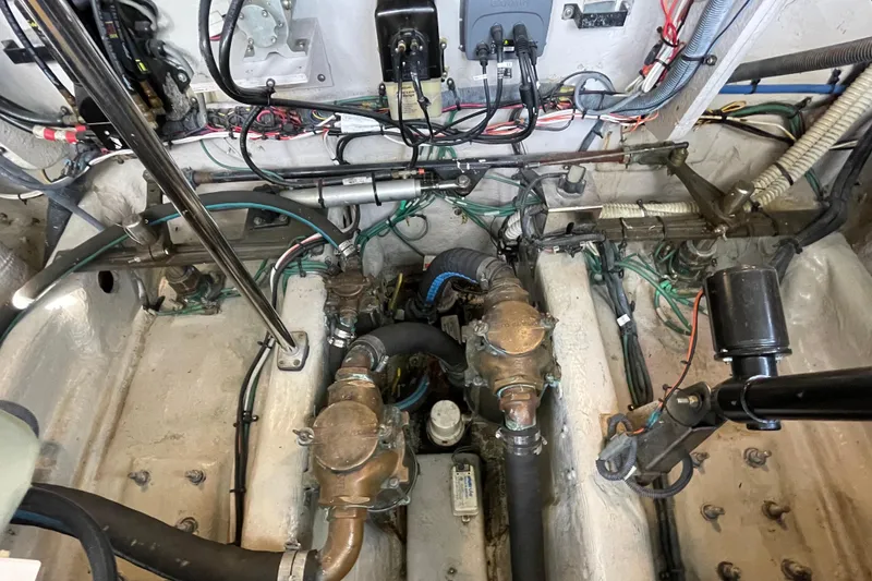 Slide: The Image of Engine compartment of a 2007 Sea Ray 40 Sundancer with visible wiring and components. - 41